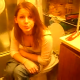 A girl begs her friend to hand over the toilet paper. Did she poop or pee? You be the judge.